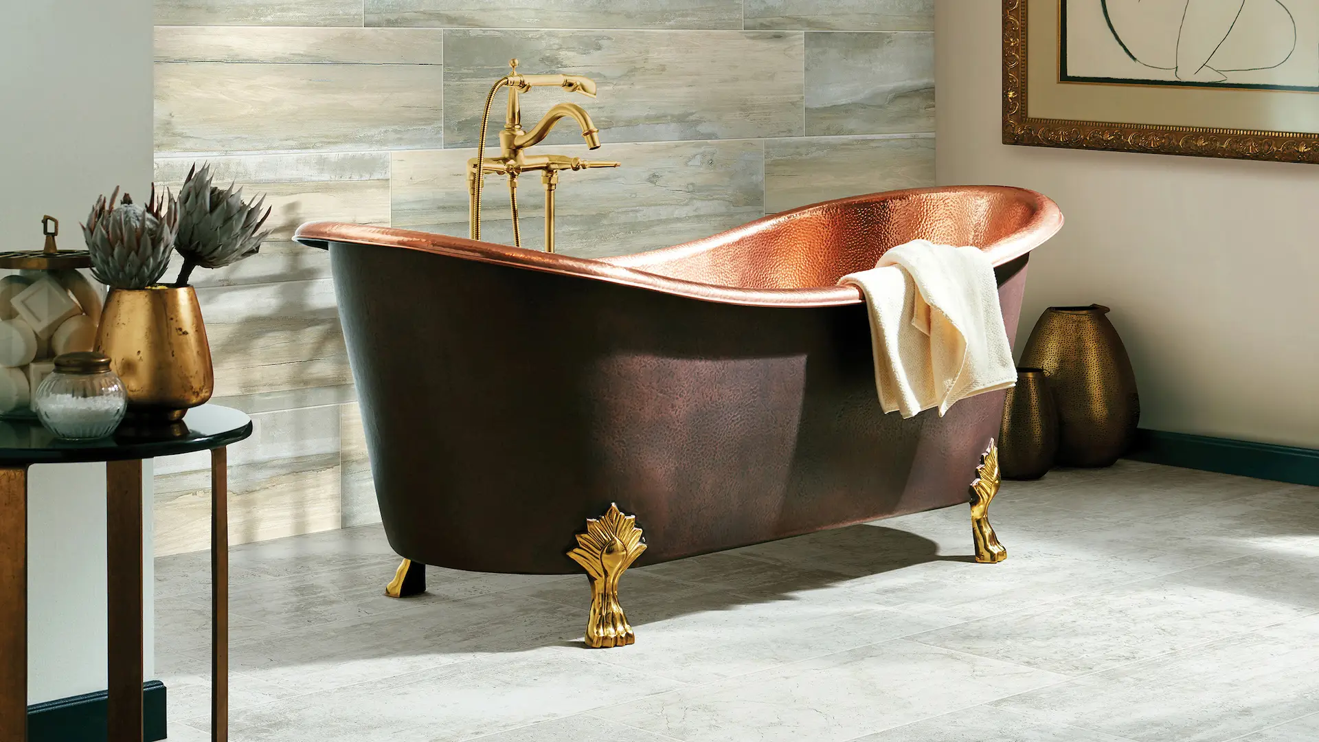 large grey tile floors in an elegant bathroom with a copper tub